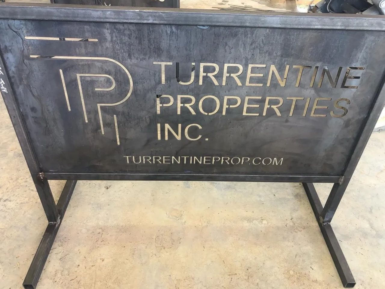 A sign that says turrentine properties inc.