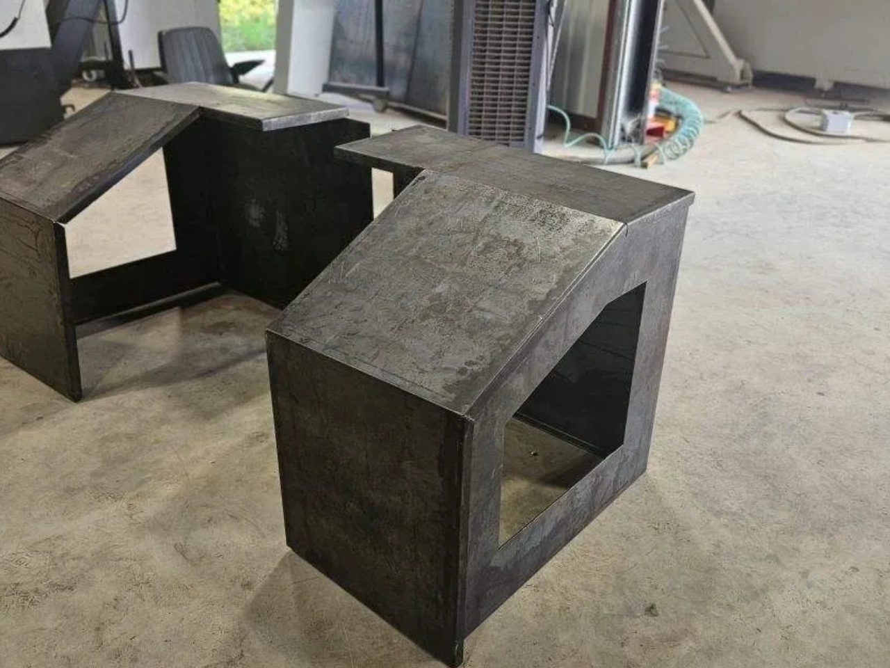 A concrete block sitting on top of the floor.